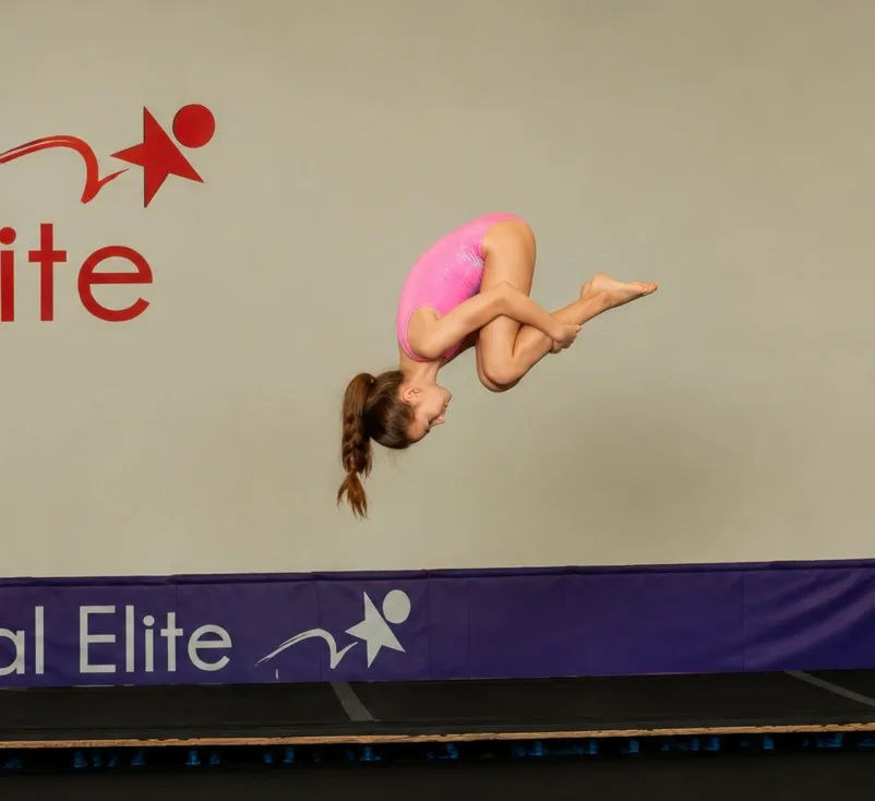 An advanced tumbler practicing a floor skill at Cal Elite