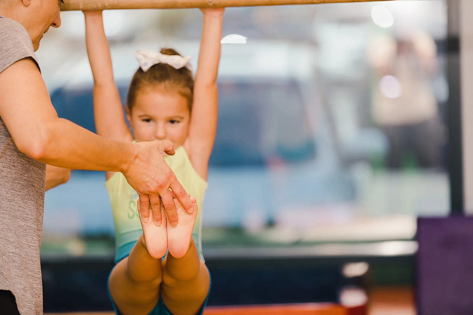 A young gymnast practicing during a Cal Elite gymnastics clinic